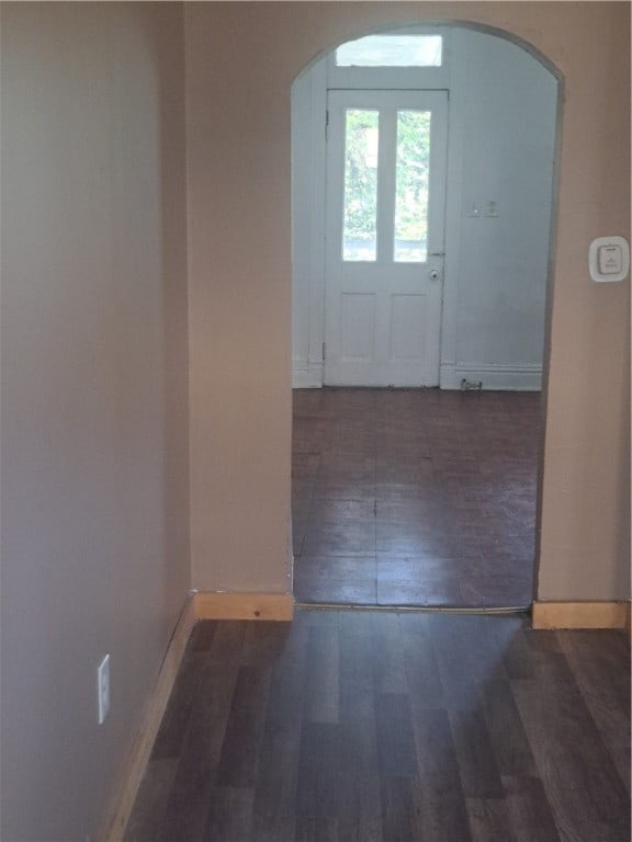 doorway to outside with dark hardwood / wood-style floors