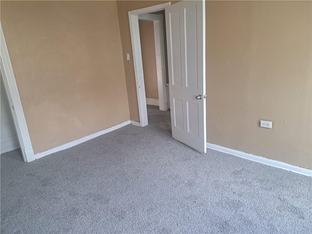 unfurnished bedroom with carpet