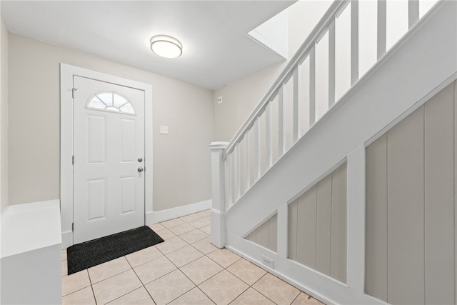 view of tiled foyer entrance