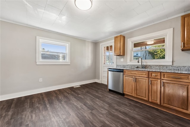 kitchen with dishwasher, sink, dark wood-type flooring, light stone counters, and crown molding