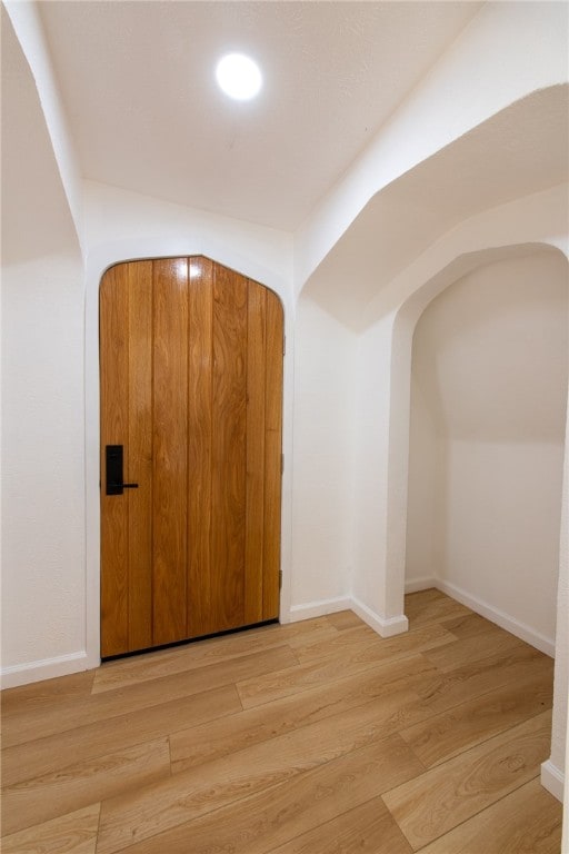 foyer with light hardwood / wood-style flooring