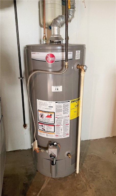 utility room featuring gas water heater