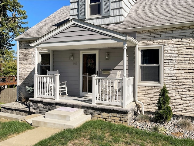 doorway to property with a porch