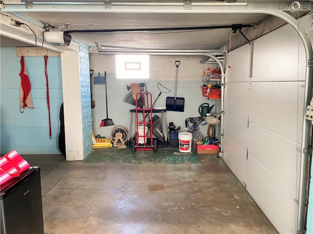 garage featuring a garage door opener