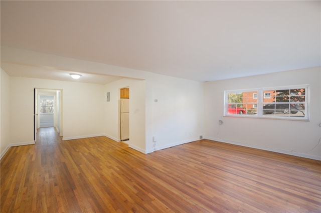 spare room featuring hardwood / wood-style floors