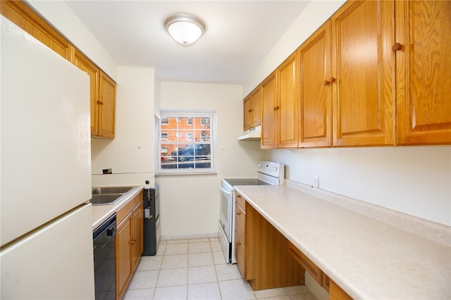 kitchen featuring light tile patterned flooring, sink, and white appliances