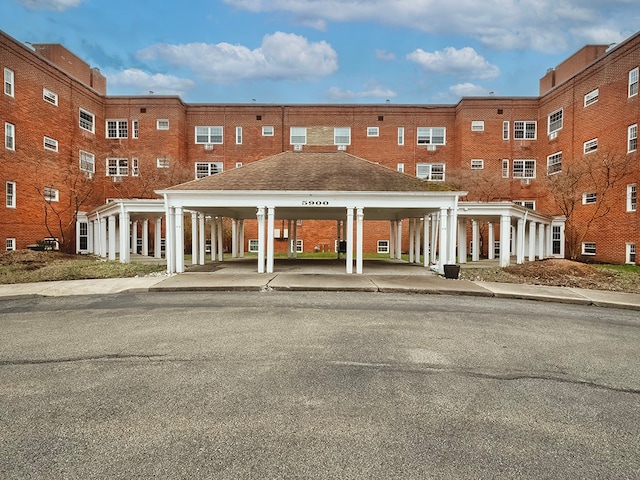 view of property featuring a carport