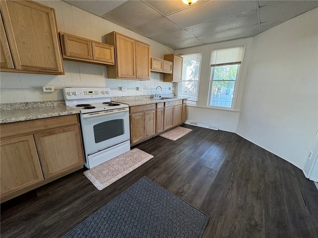 kitchen with decorative backsplash, sink, white range with electric cooktop, and dark hardwood / wood-style floors