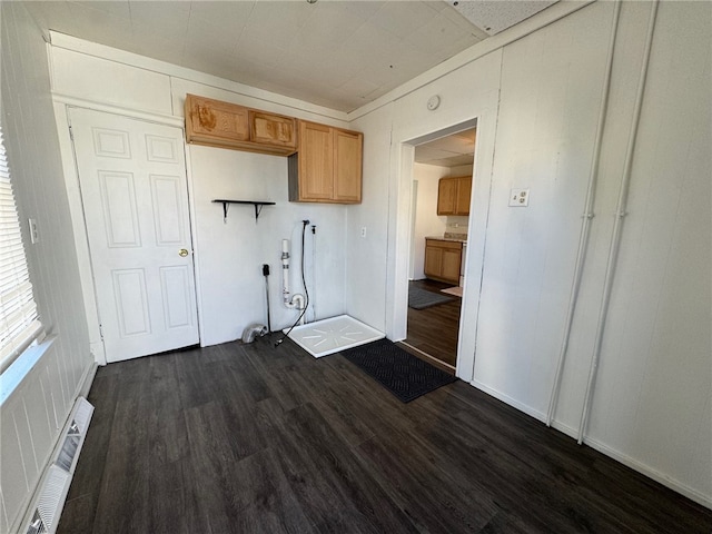 kitchen with dark hardwood / wood-style flooring