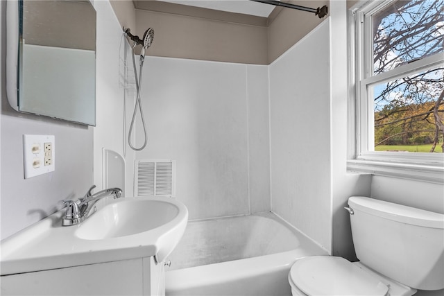 full bathroom featuring vanity, toilet, and bathing tub / shower combination