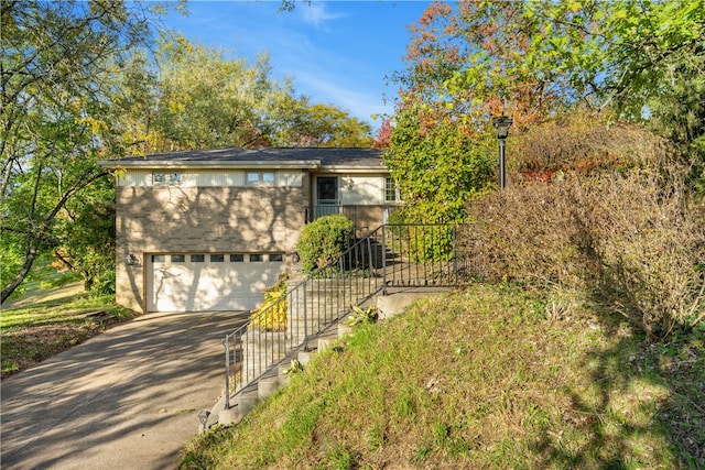 view of front of home with a garage