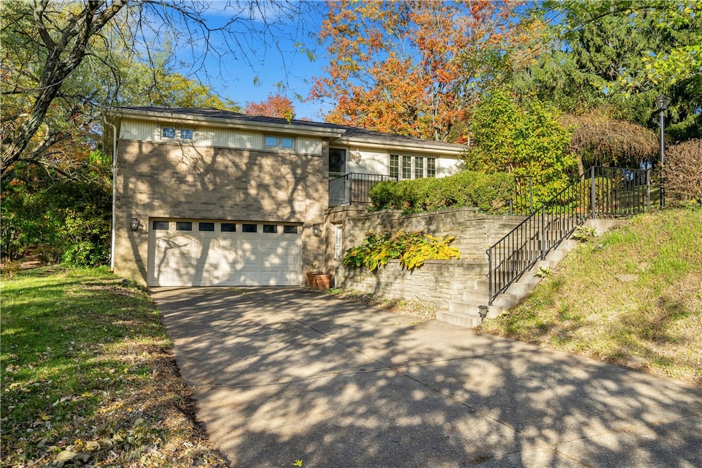 view of front of property with a garage