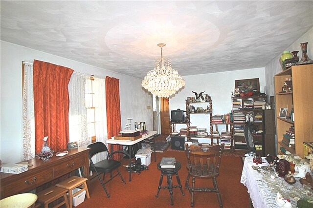 dining area featuring a chandelier and dark colored carpet