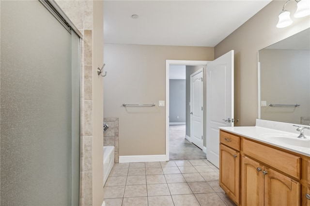 bathroom with vanity, tile patterned floors, and plus walk in shower