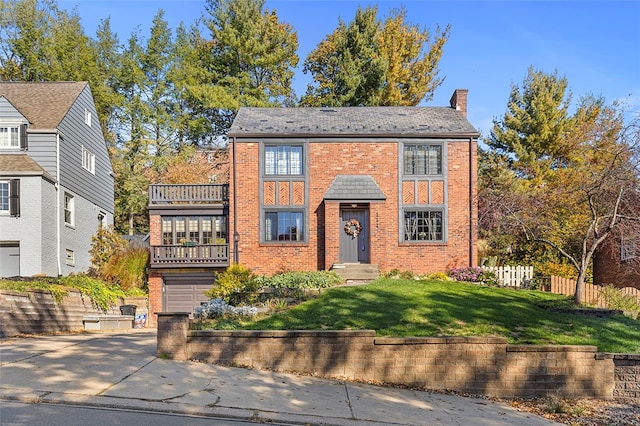 view of property with a front lawn