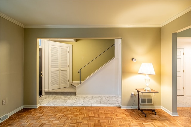 corridor featuring crown molding and light parquet flooring