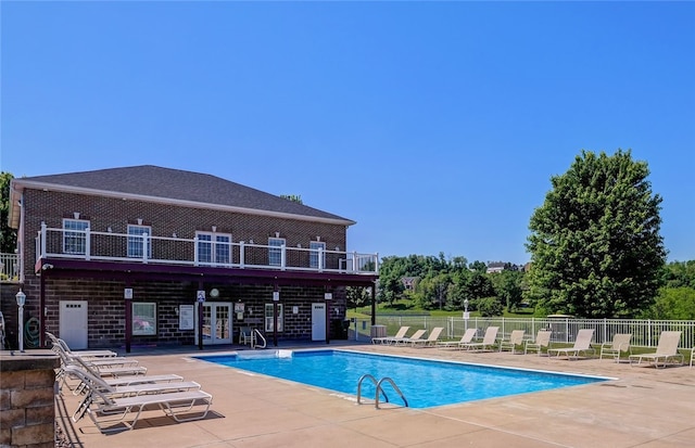 view of pool featuring a patio