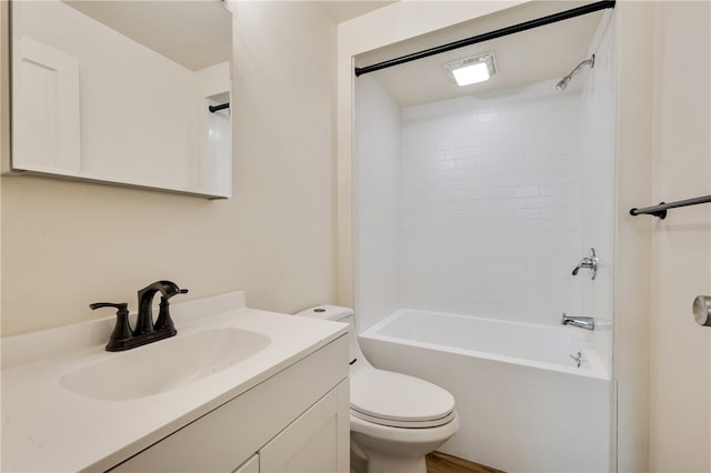 full bathroom featuring bathtub / shower combination, vanity, and toilet