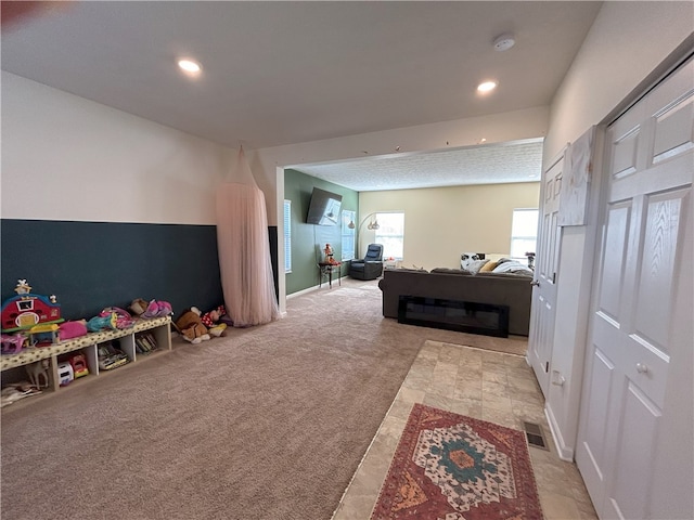 interior space featuring light colored carpet