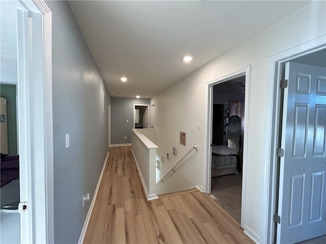 corridor featuring light hardwood / wood-style flooring