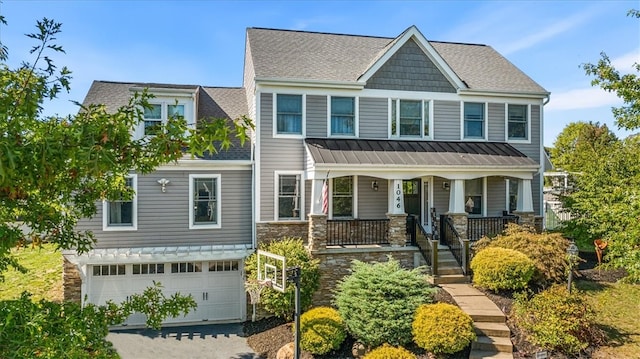 craftsman-style home with a porch and a garage