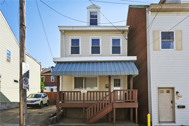 view of front of property featuring covered porch