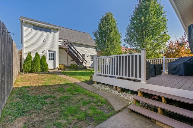 view of yard with a wooden deck