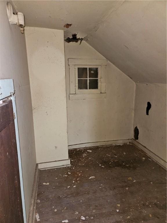 additional living space with lofted ceiling