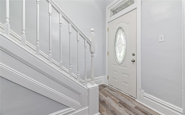 foyer entrance with light hardwood / wood-style flooring