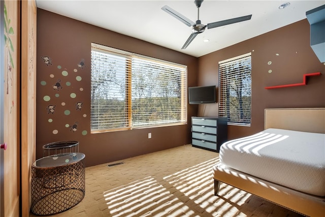 bedroom featuring ceiling fan