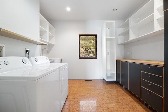 laundry room featuring independent washer and dryer