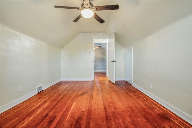 bonus room with ceiling fan, lofted ceiling, and hardwood / wood-style floors