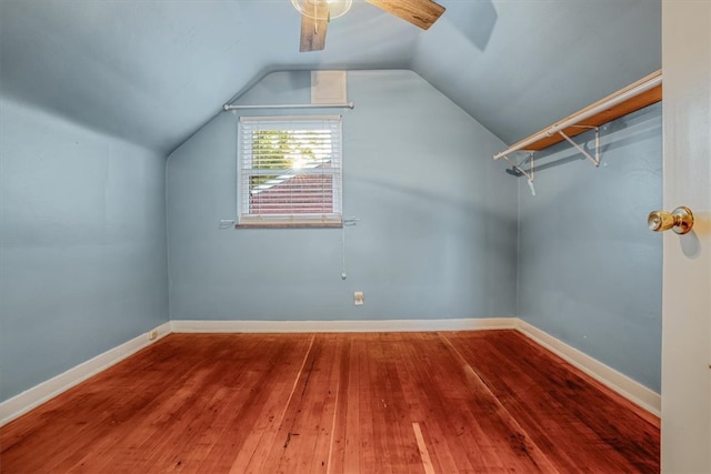 bonus room featuring lofted ceiling and hardwood / wood-style floors