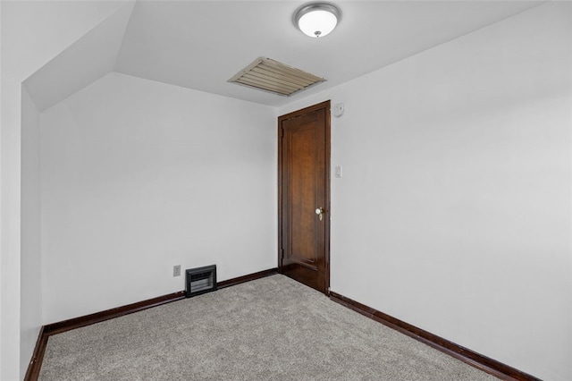 bonus room featuring lofted ceiling and carpet floors