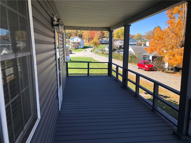 wooden deck featuring a porch