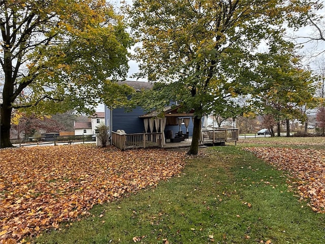 view of yard with a deck