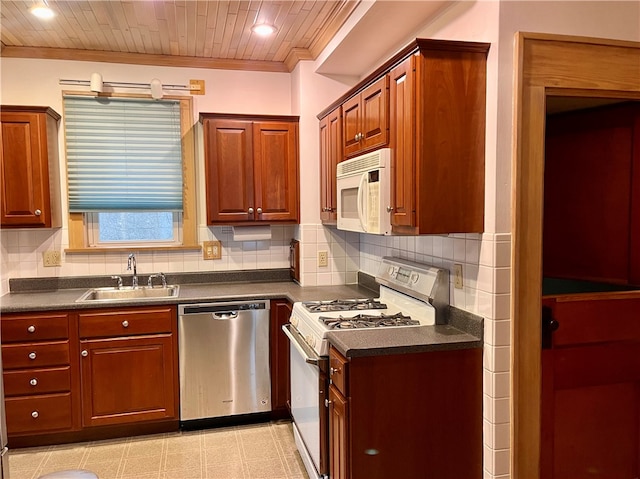 kitchen with white appliances, backsplash, sink, ornamental molding, and wood ceiling