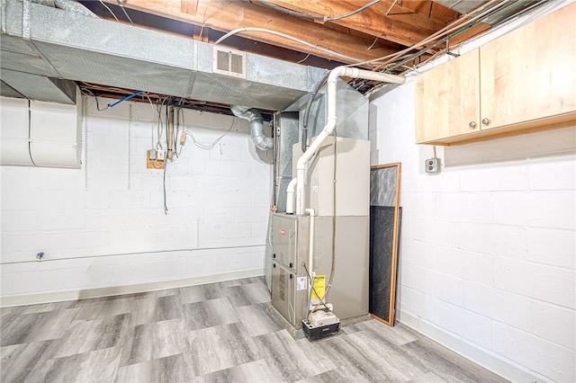 basement with heating unit