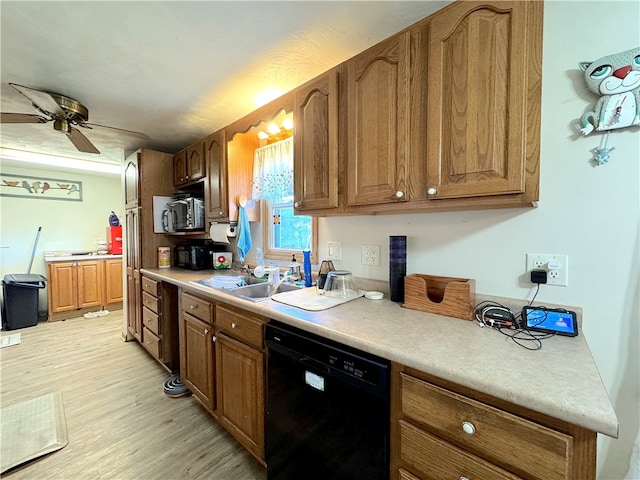 kitchen with light hardwood / wood-style floors, dishwasher, sink, and ceiling fan