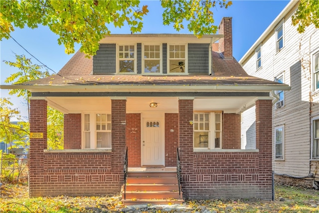 view of front of house featuring covered porch