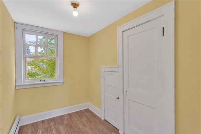 563 Coleman Ave, Greater Johnstown School District, PA 15902 - spare room with a baseboard radiator, wood finished floors, and baseboards