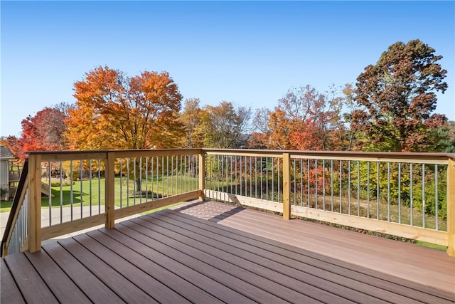 deck featuring a lawn