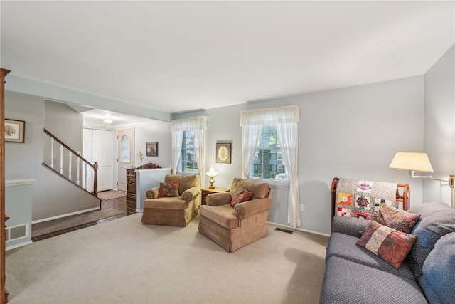 living room with light hardwood / wood-style flooring