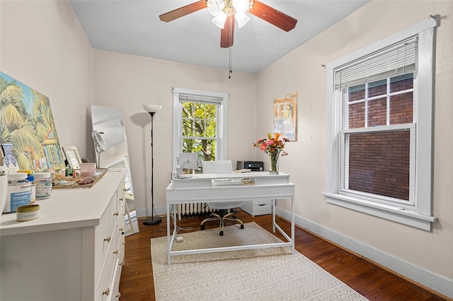 office space with hardwood / wood-style flooring and ceiling fan