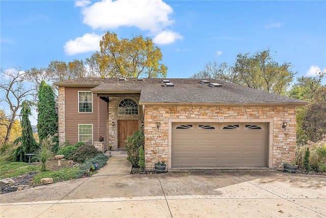 view of front of property with a garage