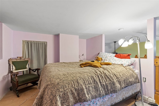 bedroom featuring hardwood / wood-style flooring