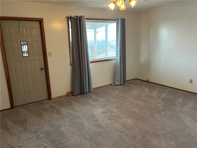 entryway with carpet flooring and ceiling fan