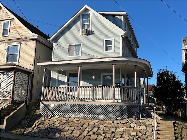 view of front of home featuring covered porch