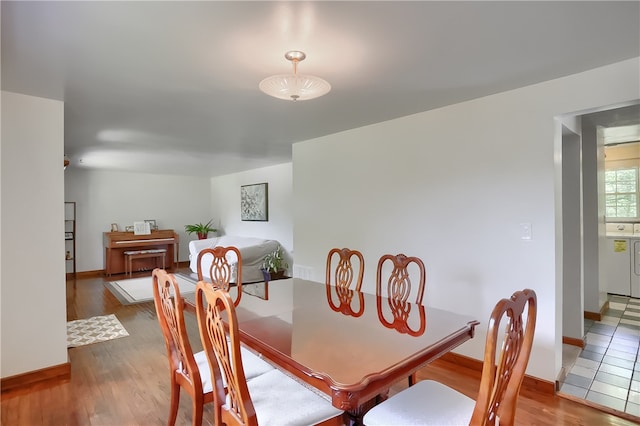 dining space featuring hardwood / wood-style floors