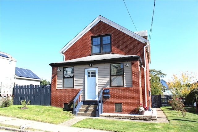 view of front of house with a front lawn